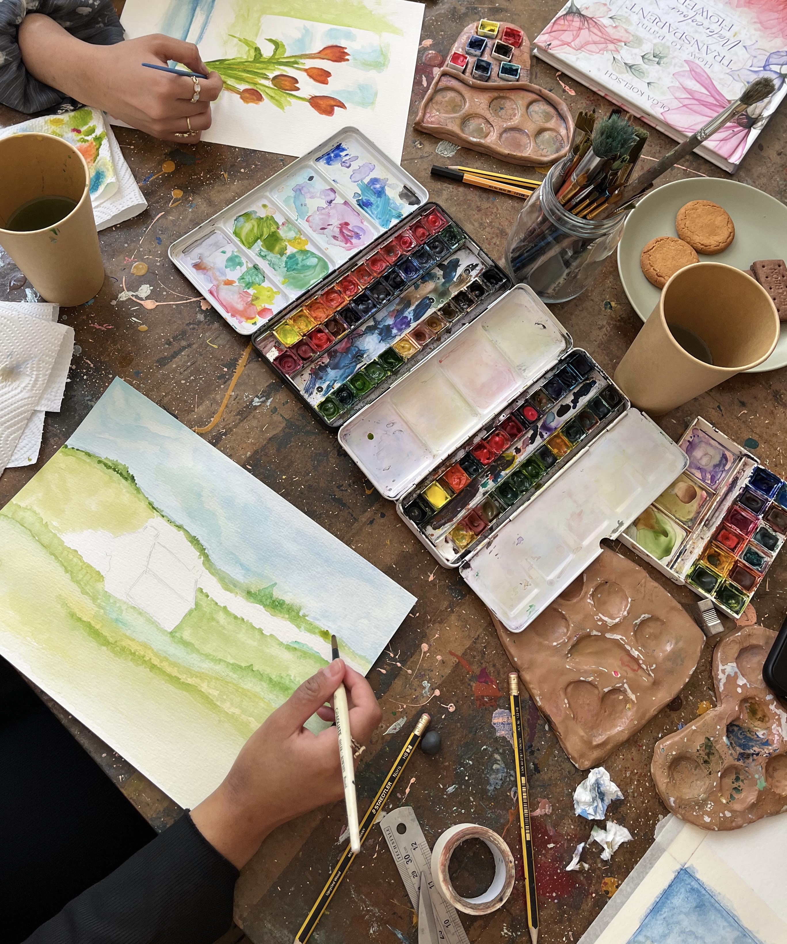 People painting and creating at Imperfect Art studio